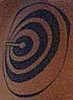 close-up of Heath's universe tattoo
